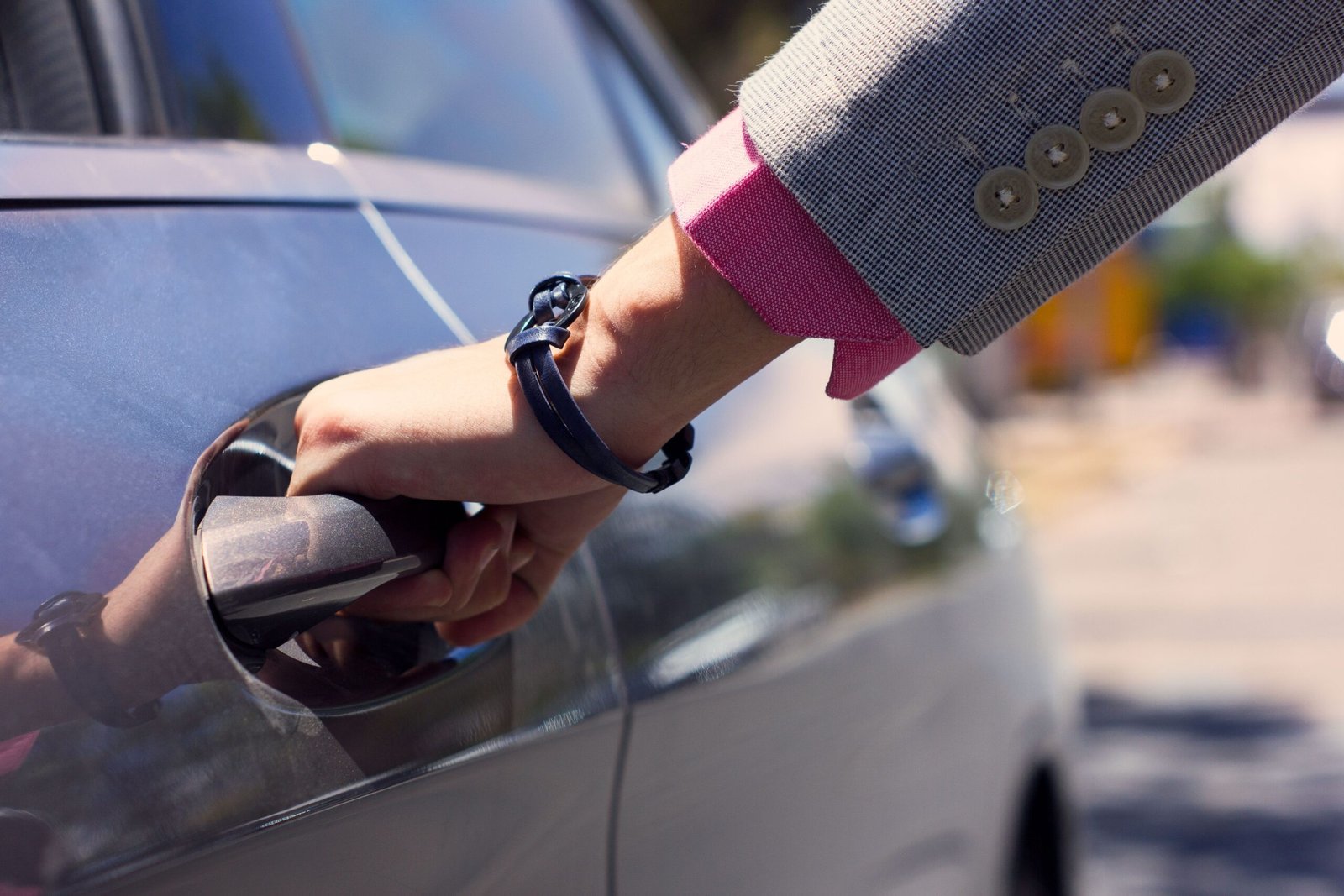 Keys Locked in Your Car? Here’s What to Do First 2 trying to open car door