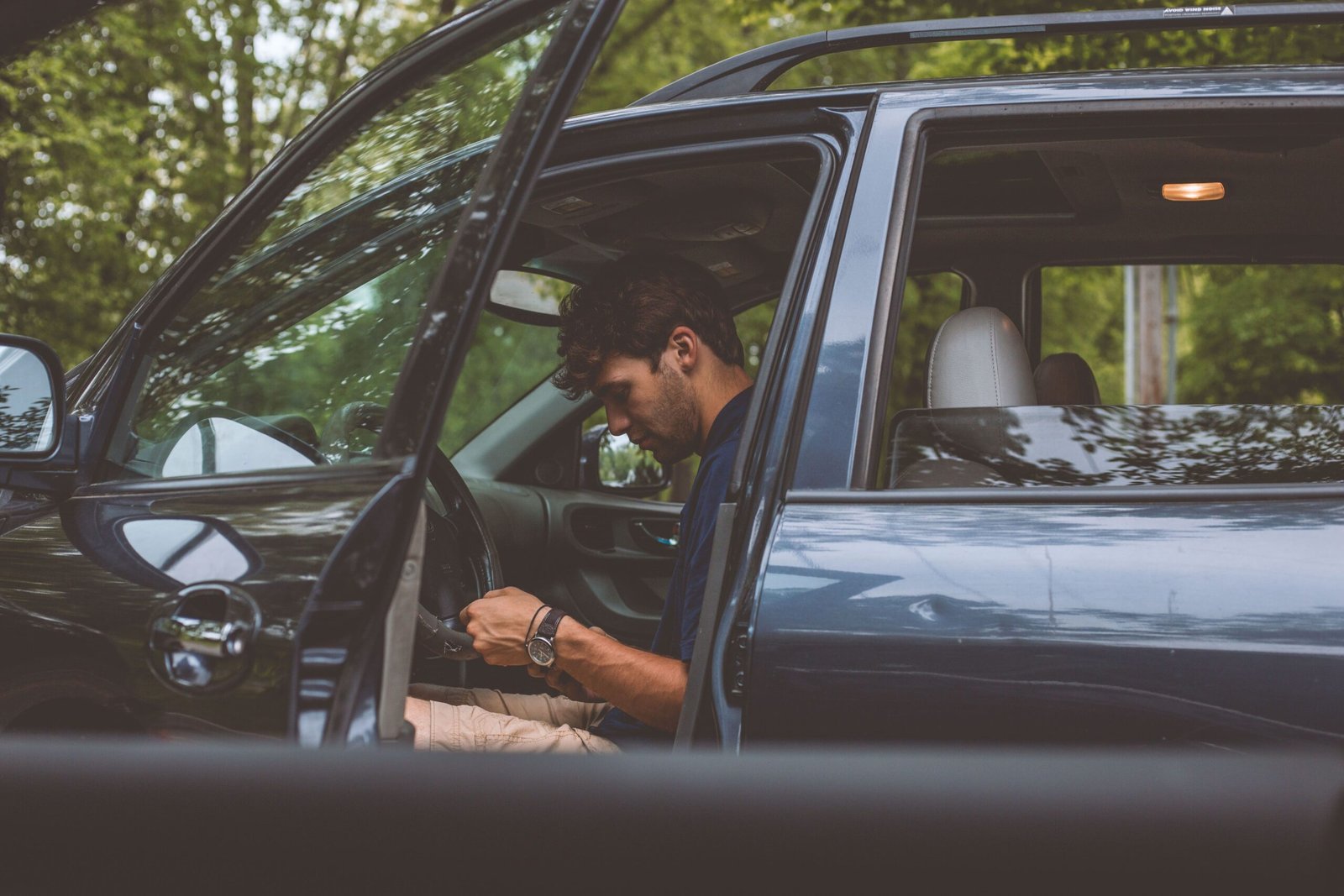 Keys Locked in Your Car? Here’s What to Do First 1 man sitting in car